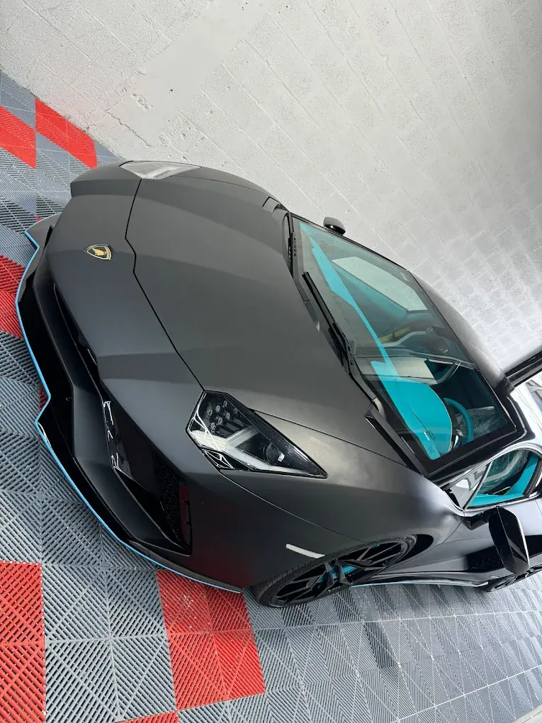 Black Ferrari Car Wrap by Black Diamonds Tinting Garage