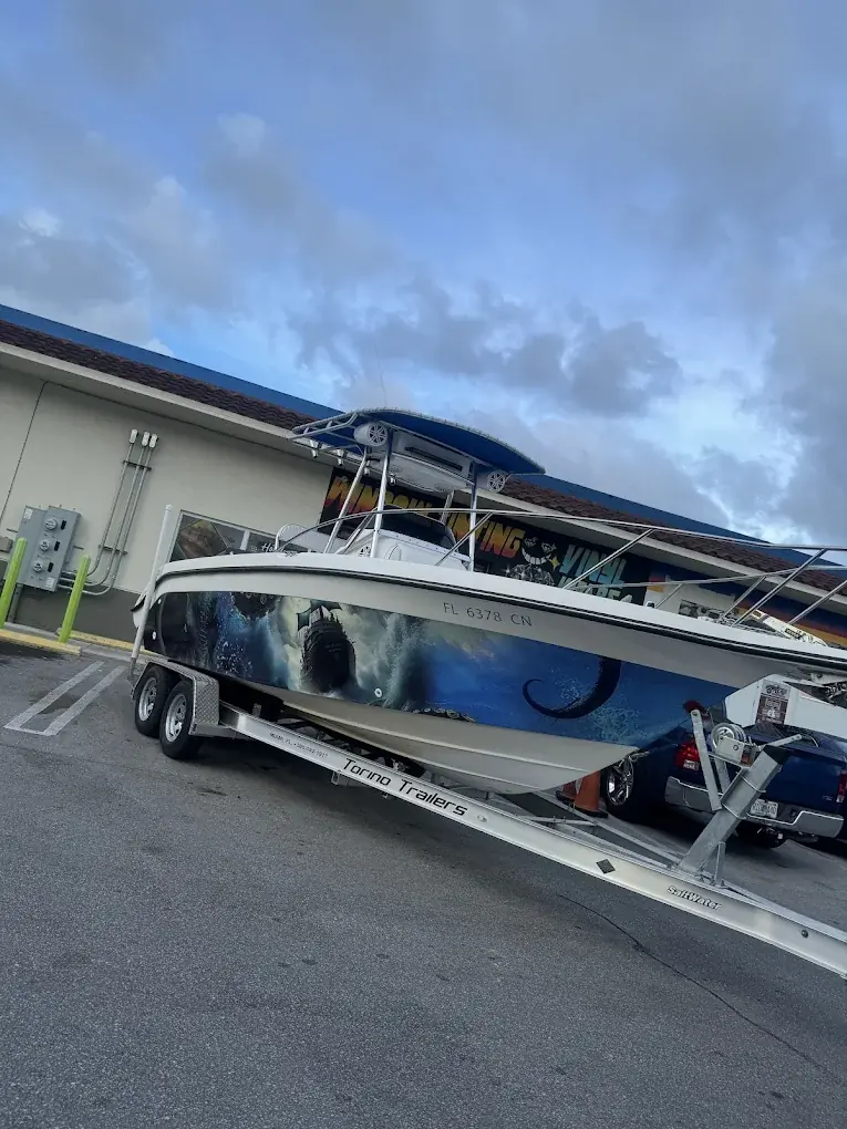 Front Of Shop Boat Wrap by Black Diamonds Tinting Garage